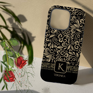Elegant zwart en goud bloemenmonogram iPhone 16 pro hoesje
