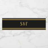 Elegant zwart en gouden monogram waterfles etiket (Enkel label)