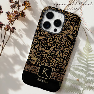 Elegant zwart en koper goud bloemenmonogram iPhone 16 pro hoesje