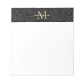 Elegant zwart gouden bloemenscript monogram notitieblok (Voorkant)