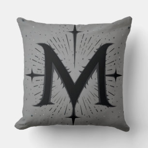 Elegant zwart 'M' ontwerp met symmetrische sterren Kussen