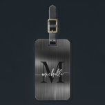 Elegant Zwarte Metaal Gouden Monogram Beginletter  Bagagelabel<br><div class="desc">Meisjesachtige stijlvolle moderne elegante monogram initiaal naam script zwart metalen gepersonaliseerde bagage label. Dit ontwerp bevat een voornaam in een mooie handgeschreven zwiert lettertype kalligrafie (of typografie) met monogram initiaal, adresinfo op namaak zwart metalen folie achtergrond. Deze zijn gemakkelijk aan te passen. Stijlvol vrouwelijk geschenk voor bruiloft, bruids douche, 16e...</div>