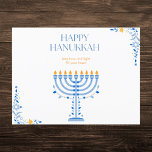 Elegante blauwe en gouden Menorah Chanoeka Feestdagenkaart<br><div class="desc">Vier het Lichtfestival met dit prachtige Chanoeka briefkaart. Met een opvallende blauwe en gouden menora, brengt deze kaart warmte en vreugde aan uw Chanoeka-groeten. De ingewikkelde bloemendetails in de hoeken voegen een vleugje elegantie toe, waardoor het een perfecte manier is om je geliefden liefde en licht te wensen dit vakantieseizoen....</div>