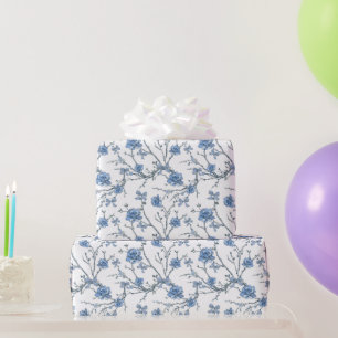 Elegante blauwe strikken en bloemrijke takken cadeaupapier