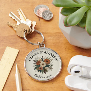 Elegante bloemaccenten en kleurenpalet sleutelhanger