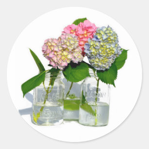 Elegante bloemen in metselaar pot ronde sticker