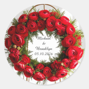 Elegante bloemenkrans versierd met rode rozen ronde sticker