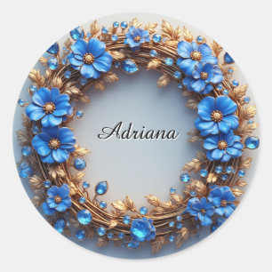 Elegante bloemenslingers van blauwe en gouden elem ronde sticker