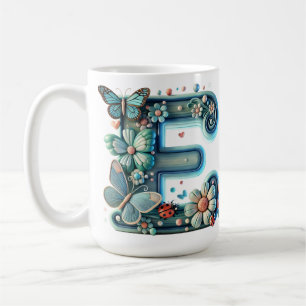 Elegante bloemletter E met vlinders Koffiemok