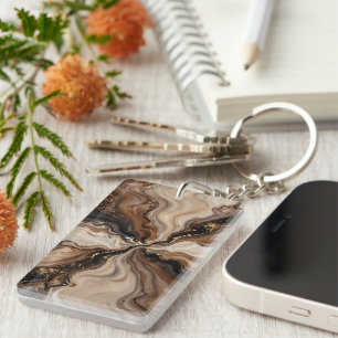 Elegante bruine en gouden vloeiende abstracte kuns sleutelhanger