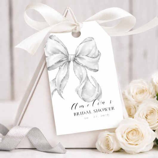 Elegante, de knoop leggende witte bruidsboog. cadeaulabel