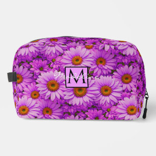 Elegante donkerroze magenta bloemenmadeliefjes toilettasje