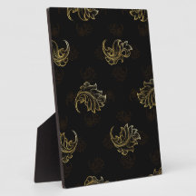 Elegante gouden bloemswirls op een zwarte achtergr