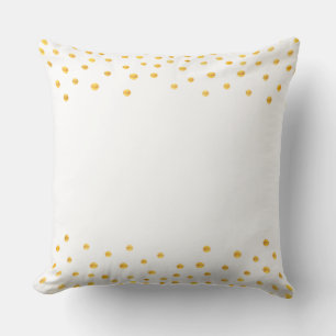 Elegante gouden confetti op wit kussen