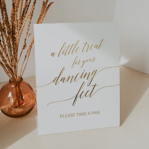 Elegante gouden kalligrafie dansvoeten reclamebord met voetstuk