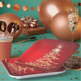 Elegante gouden kerstboom op rood papieren bordje