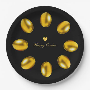 Elegante gouden paaseieren op zwart papieren bordje