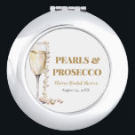 Elegante gouden parels en Prosecco Vrijgezellenfee Handtas Spiegeltje<br><div class="desc">De "Elegant Gold Pearls and Prosecco Vrijgezellenfeest Compact Mirror" is een geavanceerd accessoire dat een vleugje elegantie toevoegt aan elke bruidsviering. Versierd met ingewikkelde design geïnspireerd door gouden parels en het bruisen van Prosecco, is deze compacte spiegel zowel stijlvol als praktisch. Perfect voor snelle touch-ups onderweg, deze spiegel is een...</div>