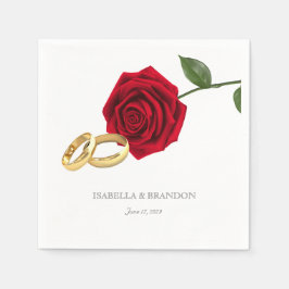 Elegante gouden ringen en rode rozen bruiloft servet