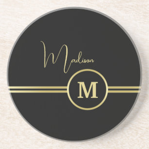 Elegante gouden signatuurmonogram op zwart zandsteen onderzetter