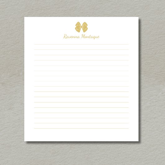 Elegante gouden strik met handgeschreven aangepast notitieblok