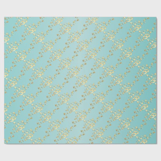 Elegante gouden trouwringen op lichtblauw cadeaupapier (Vlak)