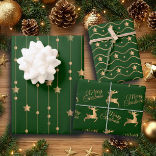 Elegante groene gouden glitter sterren en rendiere inpakpapier vel