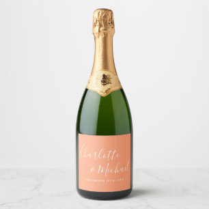 Elegante handtekening script perzik bruiloft sparkling wijnetiket