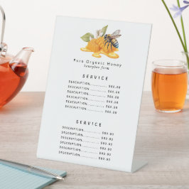 Elegante honingraten met bij reclamebord met voetstuk