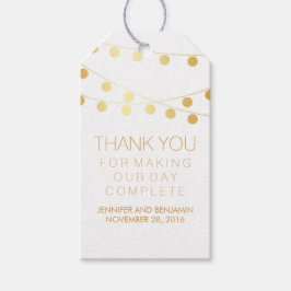 Elegante huwelijksfeestverlichting met gouden foli cadeaulabel