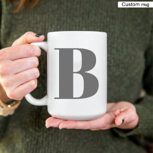 Elegante initiaal in zwart en wit monogramletter  tweekleurige koffiemok