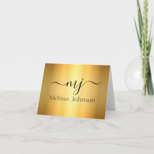 Elegante initialen op goud notitiekaartje