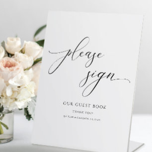 Elegante kalligrafie script huwelijksgastenboek bo reclamebord met voetstuk