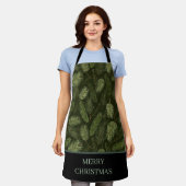 Elegante kersttakken op zwart schort (Gedragen)