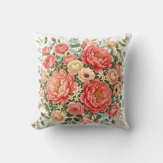 Elegante koraal- en perzikpioen bloemstuk kussen