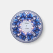 Elegante krans versierd met blauwe bloemen magneet