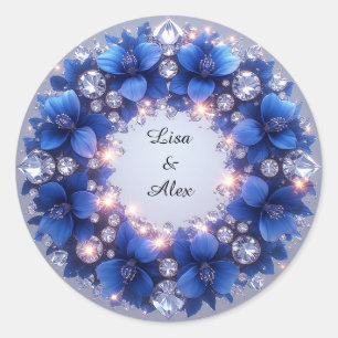 Elegante krans versierd met blauwe bloemen ronde sticker