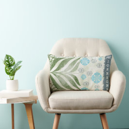 Elegante kussen met familienaam en bladmotief