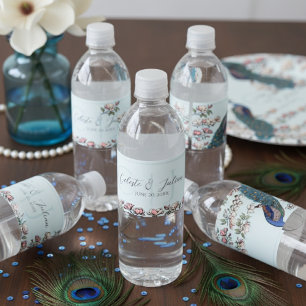 Elegante lichtblauwe bloemen pauw bruiloft waterfles etiket