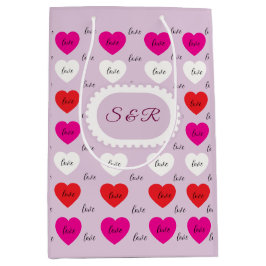Elegante Liefdestypografie en Hartjes Patroon Medium Cadeauzakje