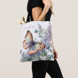 Elegante lila bloemen en vlinder tote bag