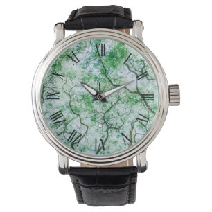 Elegante maar spookachtige bladeren en takken Mann Horloge