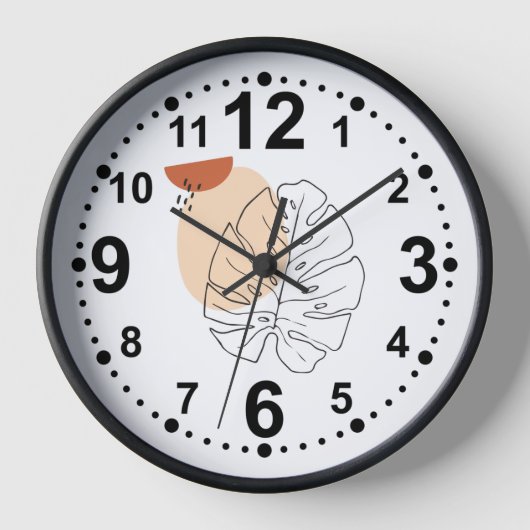 Elegante minimalistische wandklok met bladontwerp (Voorkant)