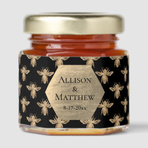 Elegante moderne zwarte gouden bijenbruiloft