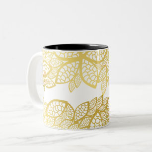 Elegante mok met botanisch bladgoudpatroon