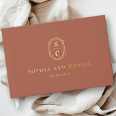 Elegante monogram terracotta bruiloft namen datum gastenboek