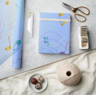 Elegante muzieknoten in blauwe gradiënt cadeaupapier
