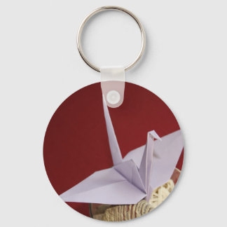 elegante origamikraan sleutelhanger