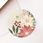 Elegante Poinsettia Monogram Vakantie Waterverf Ronde Sticker<br><div class="desc">___________________________ ***Dit ontwerp maakt deel uit van een kerstvakantie collectie*** Stap in een wereld van tijdloze vakantie charme met mijn "Feestelijke Flora: Christmas Splendor Poinsettia Delight" collectie. 🌸🎄 Omhels de magie van het seizoen met een boeiende mix van bloemblaadjes, weelderige groene dennenbladeren, sierlijke rode bessen en de betoverende tinten van...</div>