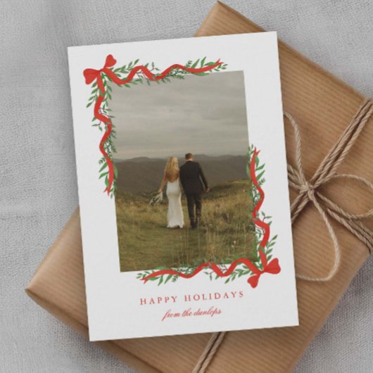 Elegante rode boog met groen Foto Feestdagenkaart